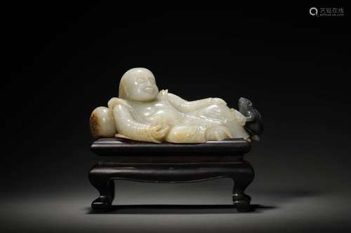 A QING WHITE JADE FIGURE