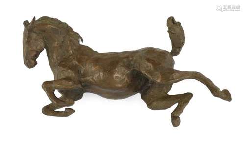 Lissa Borkowski (b.1949). A bronze model of a recumbent foal...