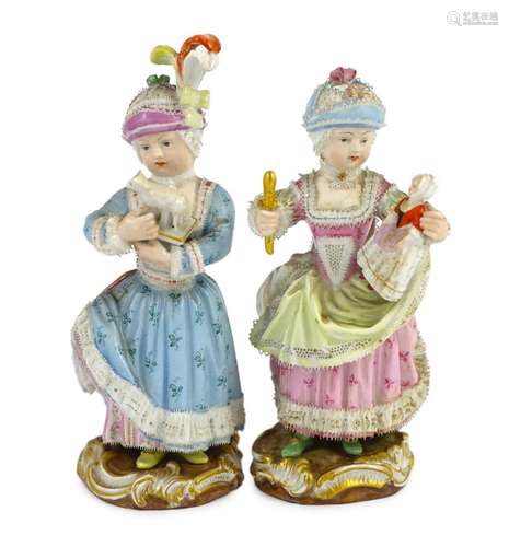 Two Meissen figures of a girl holding a doll and another wit...