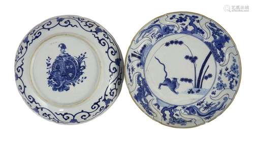 A pair of Chinese blue and white armorial dishes in Japanese...