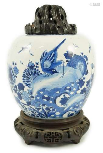 A Chinese blue and white ‘birds and rockwork’ ovoid jar, Kan...