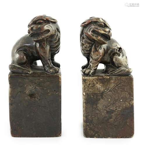 A pair of Chinese soapstone lion-dog seals, Qing dynasty