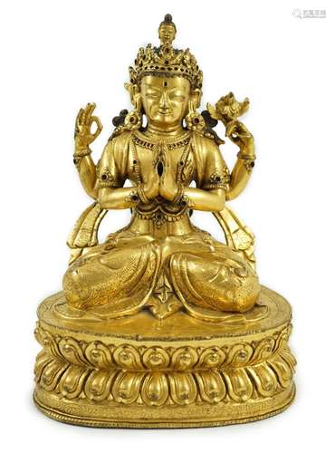 A Sino-Tibetan gilt bronze figure of Shadakshari Lokeshvara,...