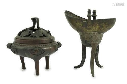 A Chinese bronze and copper alloy tripod censer and cover an...