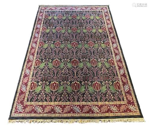 A large Indian Arts & Crafts style carpet, 541 x 358cm