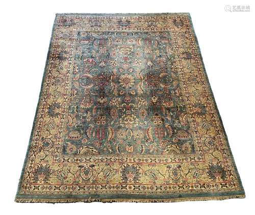 An Indian Persian style sage green ground carpet, 465 x 363c...