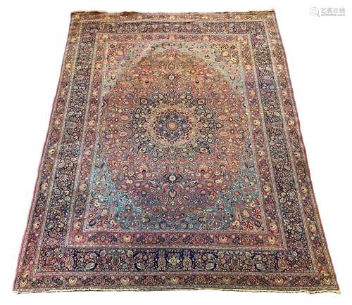 A large Persian blue ground carpet, 395 x 305cm