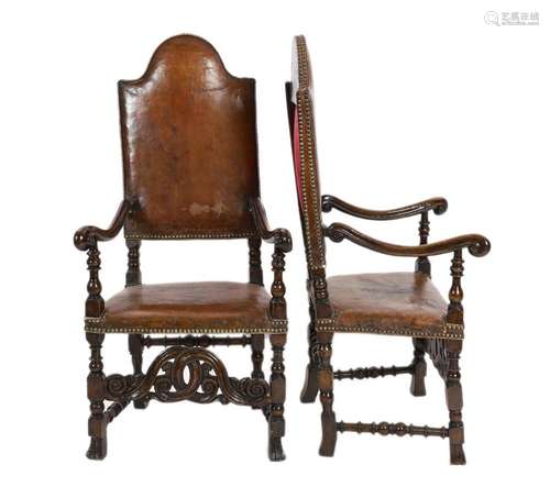 A pair of late 17th century Spanish walnut and elm armchairs...