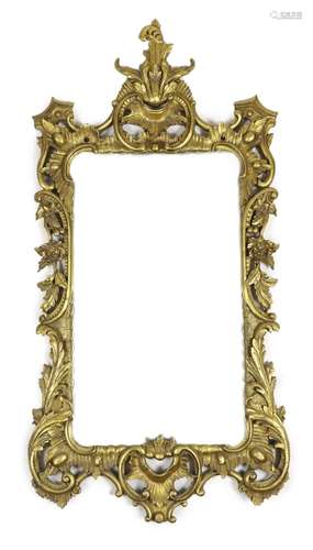 A 19th century Chippendale style carved giltwood wall mirror...