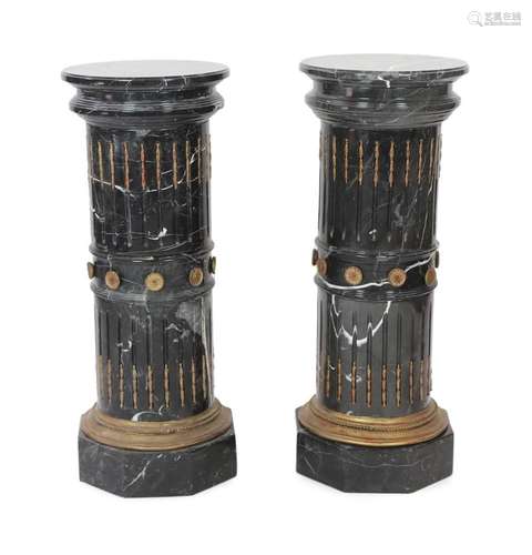 A pair of ornate variegated green marble columns, diameter 4...