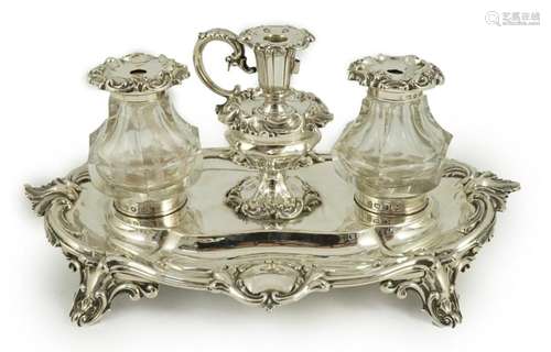 An ornate Victorian silver oval inkstand, by Henry Wilkinson...