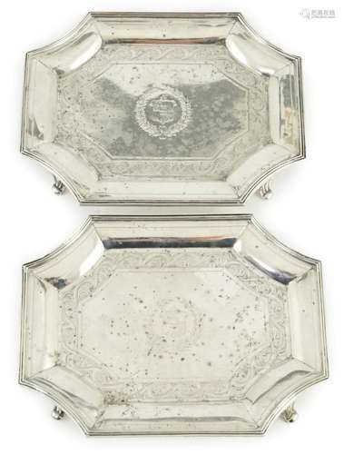 A pair of late Victorian engraved silver teapot stands, by H...