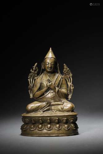 A CHINESE GILT BRONZE FIGURE OF BUDDA