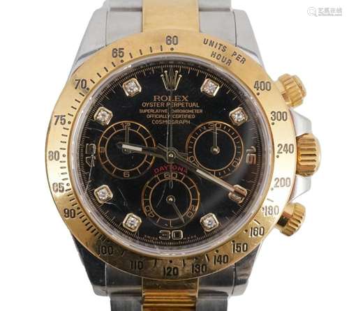 A gentleman's 2015 18ct gold and stainless steel Rolex O...