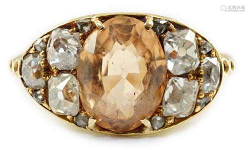 A 1940's gold and single stone oval cut orange topaz set...