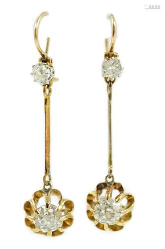 A pair of late 19th/early 20th century gold and four stone d...