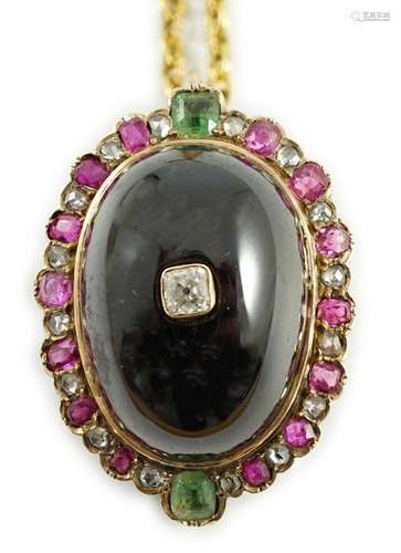 A gold, cabochon garnet, emerald, ruby and diamond cluster s...