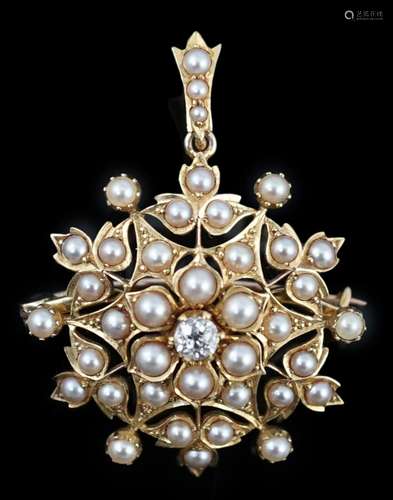 An Edwardian single stone diamond and seed pearl cluster set...