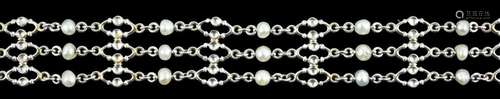 An early to mid 20th century white gold and seed pearl set t...