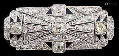 An Art Deco pierced platinum and millegrain set diamond clus...