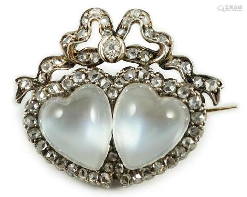 An Edwardian gold and silver, moonstone and diamond cluster ...