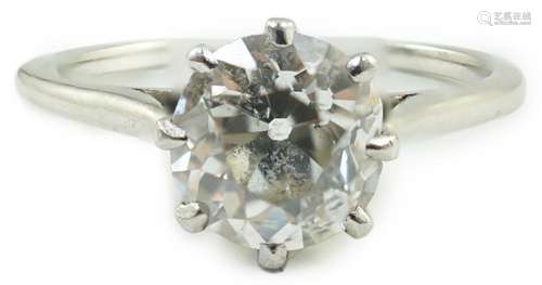 A platinum and solitaire diamond set ring