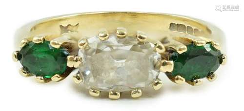 A modern 18ct gold, diamond and green tourmaline set three s...