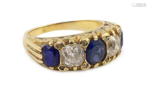 An early 20th century 18ct gold, three stone sapphire and tw...