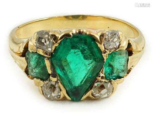 A gold, emerald and diamond cluster ring