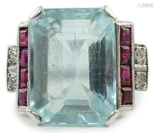 A platinum and single stone emerald cut aquamarine set dress...