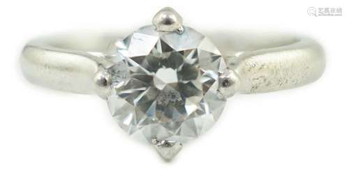 A modern platinum and solitaire diamond set ring