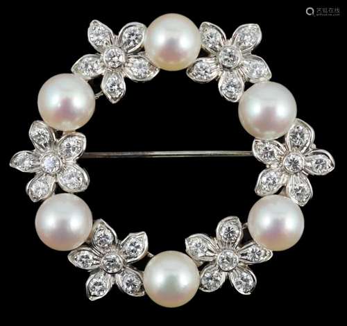 A late 20th century white gold cultured pearl and diamond cl...