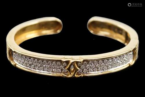 A modern 18k gold and pave set diamond Cartier open work hin...