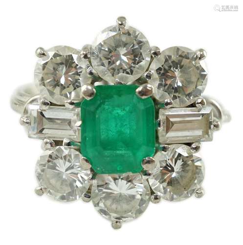 A mid 20th century 18kt white gold, single stone emerald and...