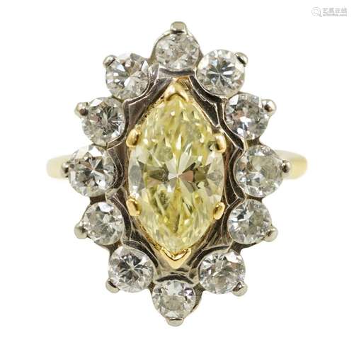 An 18ct gold and single stone fancy yellow diamond set marqu...