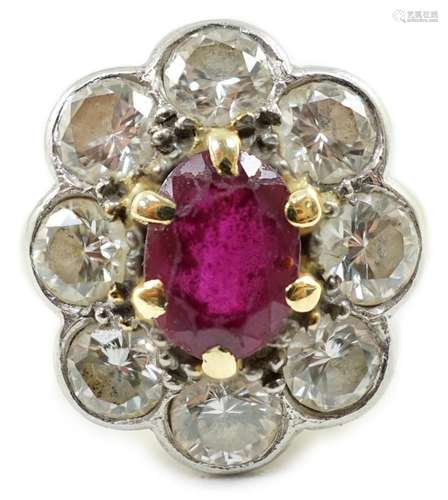 An 18ct gold, claw set single stone ruby and eight stone col...