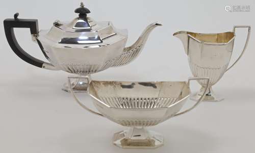 A silver three-piece tea set, Sheffield, 1923, maker HLB, co...