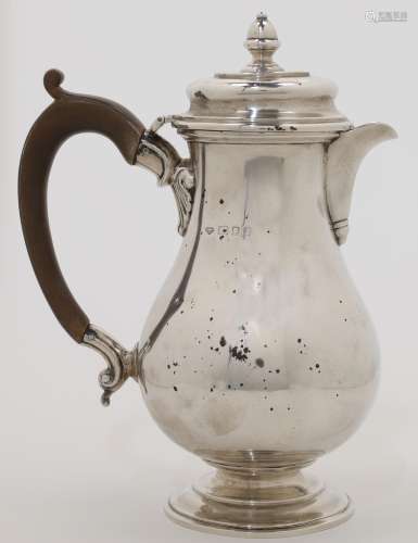 A silver hot water pot, London, 1934, Goldsmiths & Silve...