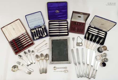 A group of silver, to include: including five coffee spoons ...