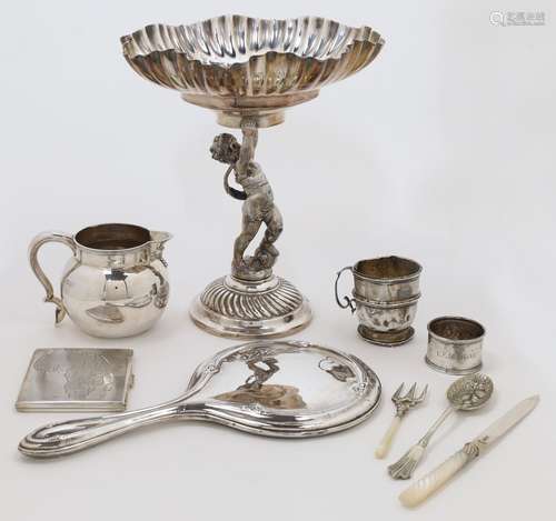 A group of silver and silver plate, comprising: a silver mil...