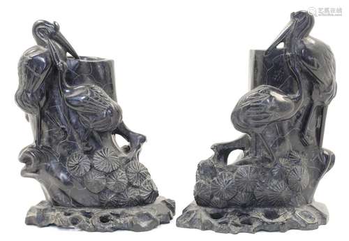 A pair of Japanese carved hardstone spill vases, 20th centur...