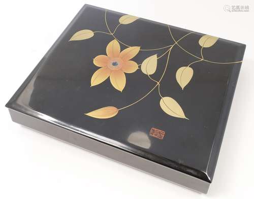 A Japanese black lacquer rectangular box and cover, 20th cen...