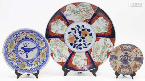 A large Japanese porcelain charger, 20th century, decorated ...