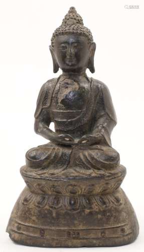 A Chinese bronze figure of a seated buddha, 19th century, wi...