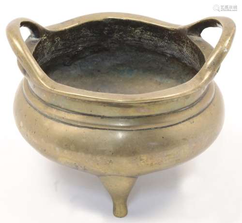 A Chinese bronze censer, 19th century, cast in circular form...