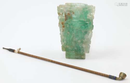 A Chinese fluorite vase, 20th century, the tapering body wit...