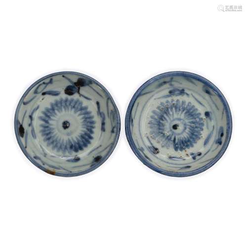 A pair of Chinese Nyonya blue and white saucer dishes, Qing ...