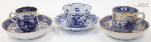 Three sets of Chinese export blue and white cups and saucers...