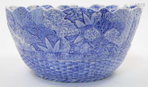 A large Chinese porcelain basket weave and floral decorated ...