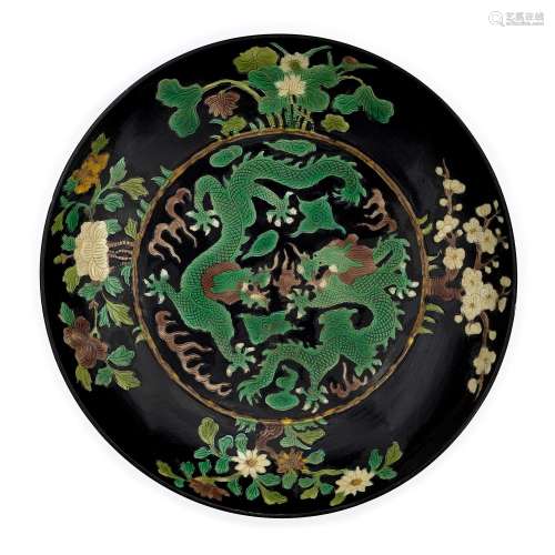A Chinese famille noire dragon plate, Republic period, apocr...